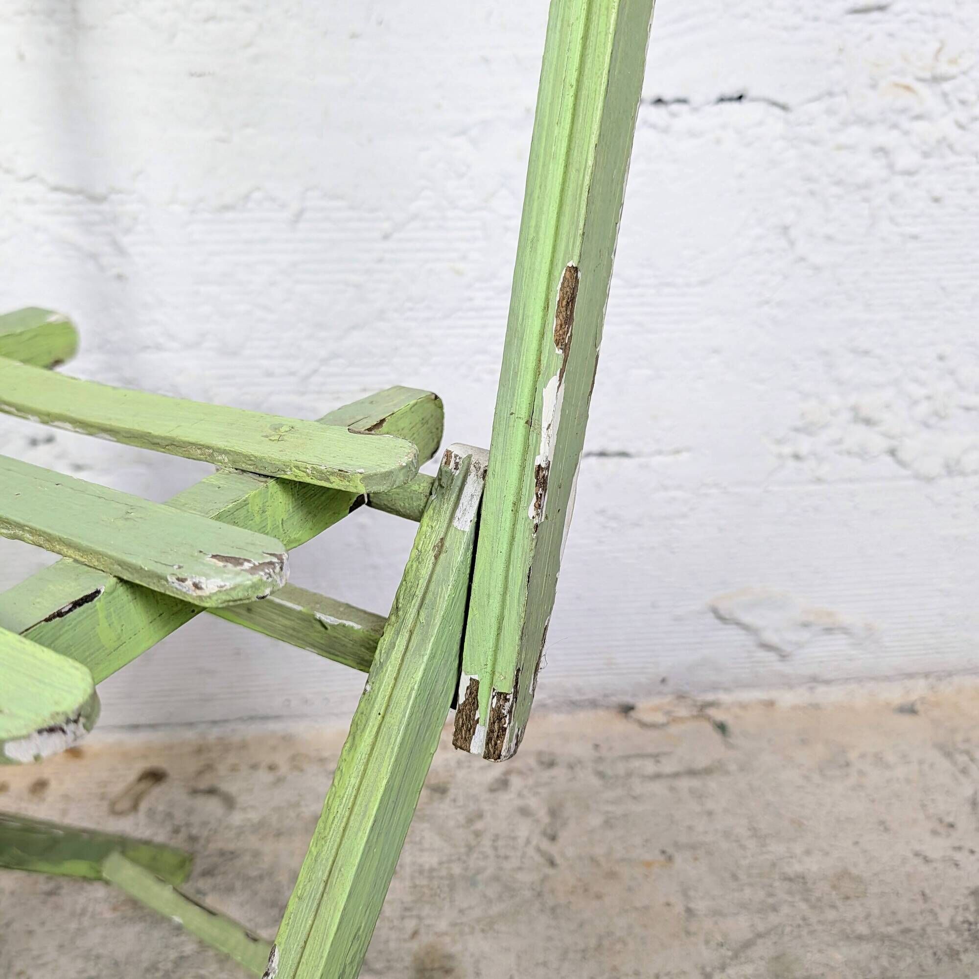 Child's folding chair in patinated green wood