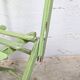 Child's folding chair in patinated green wood