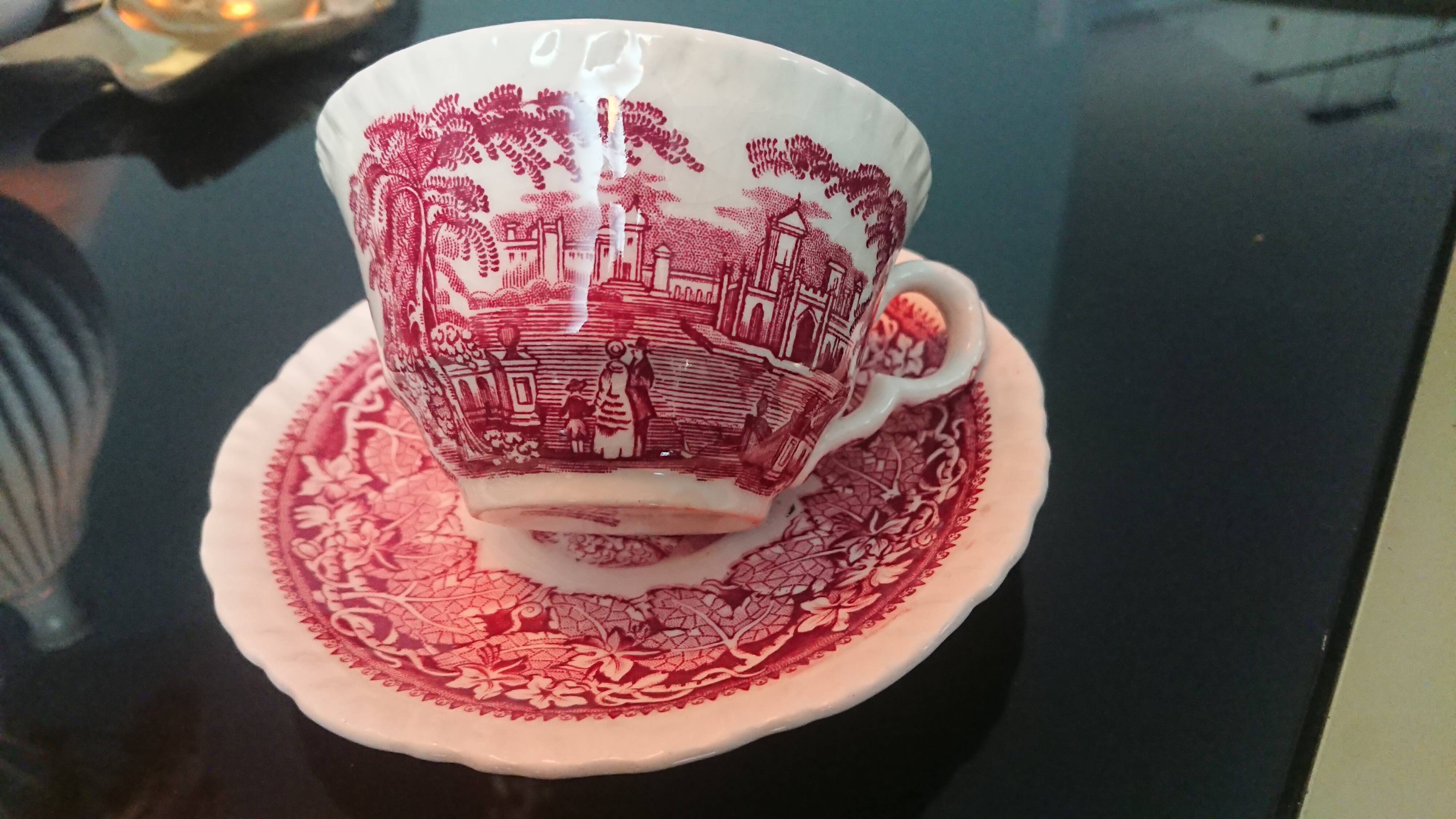 Tea cup and English earthenware saucer