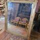 Antique gilded mirror from the 19th century, mercury mirror.