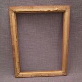 Old frame in worked wood