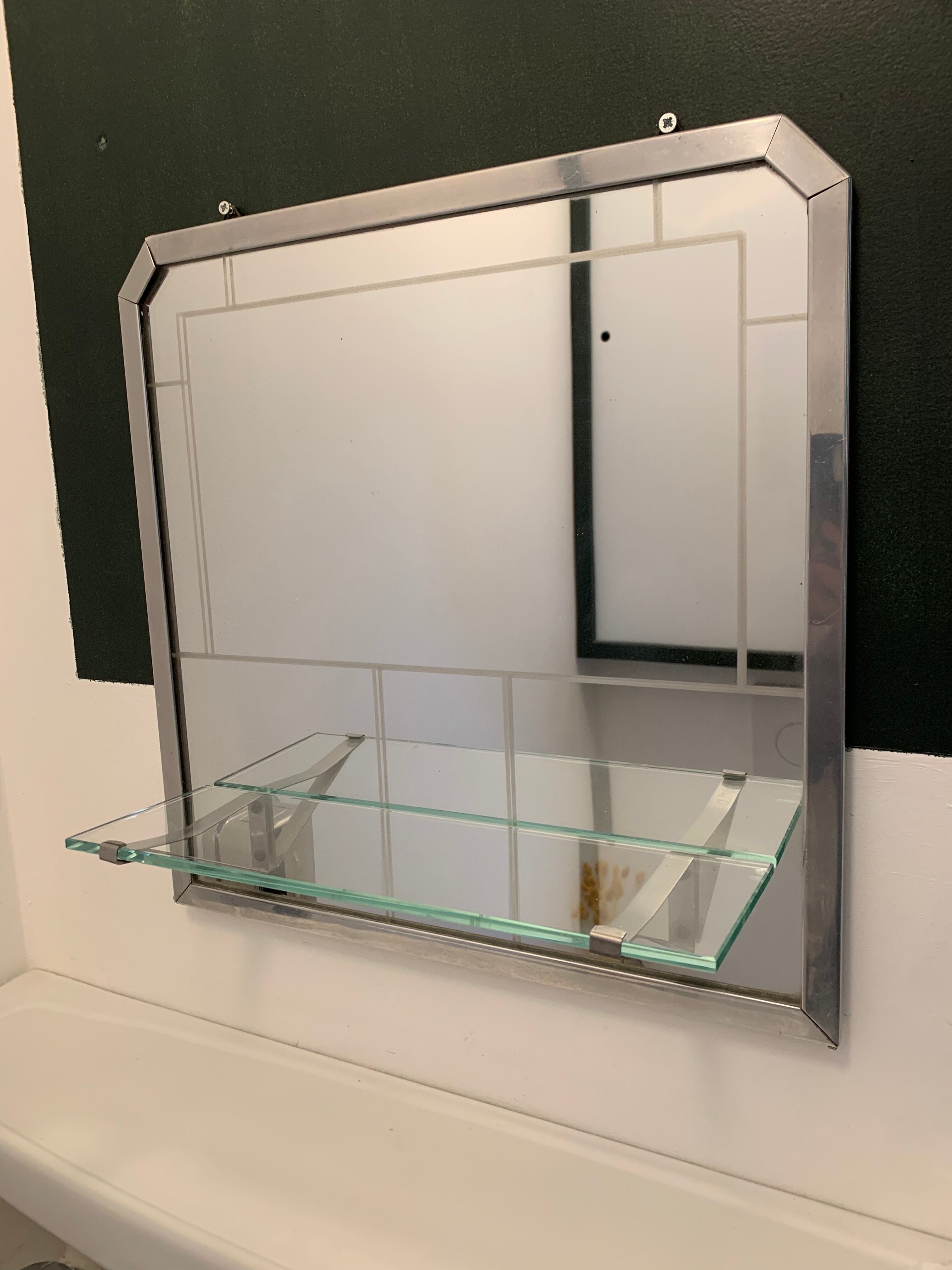 Bathroom mirror with art deco shelf