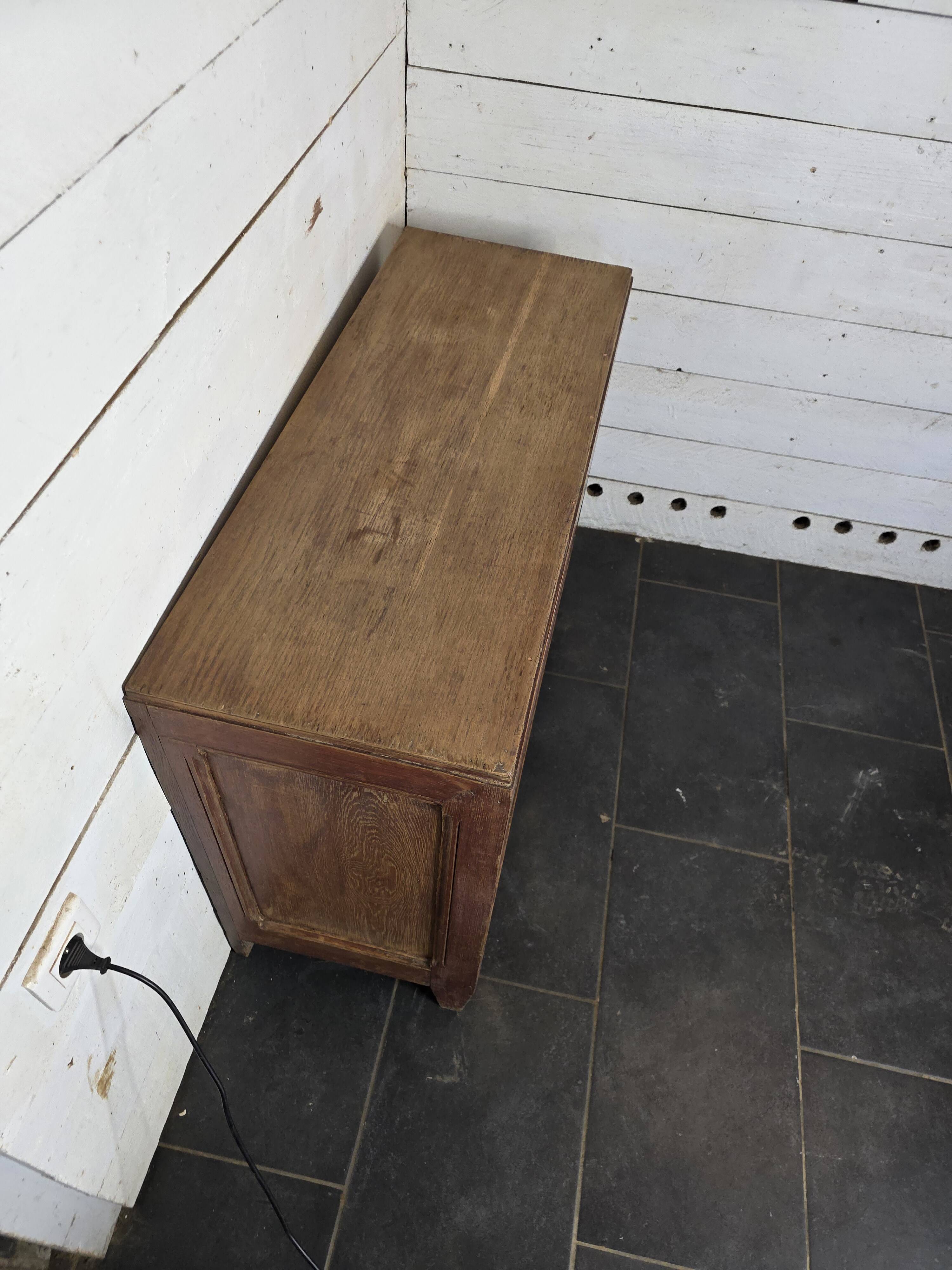 Antique oak sideboard with sliding doors