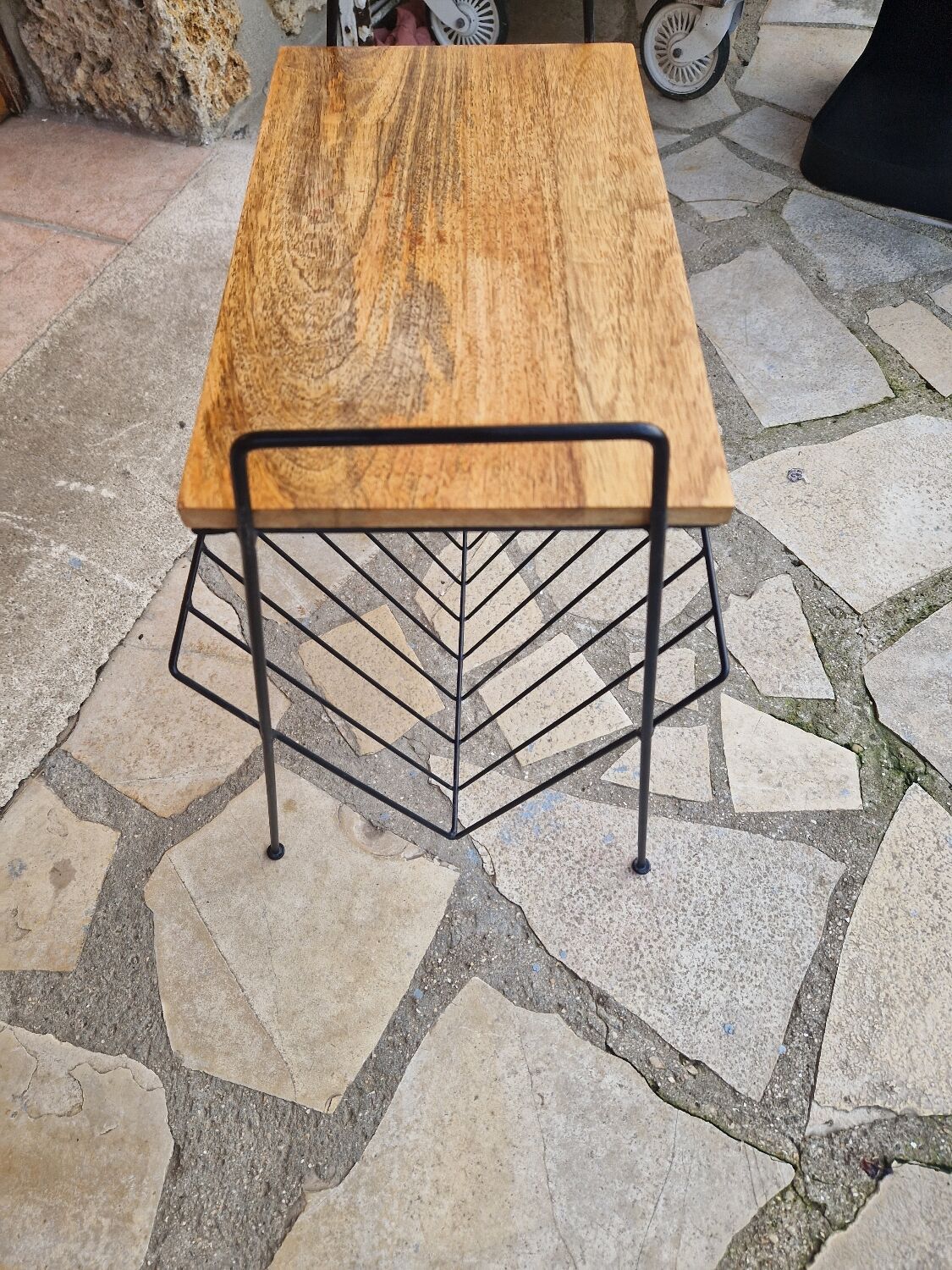 Bedside table with magazine holder