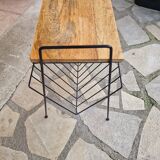 Bedside table with magazine holder