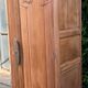 Art Deco wardrobe with bevelled mirror in solid raw walnut.
