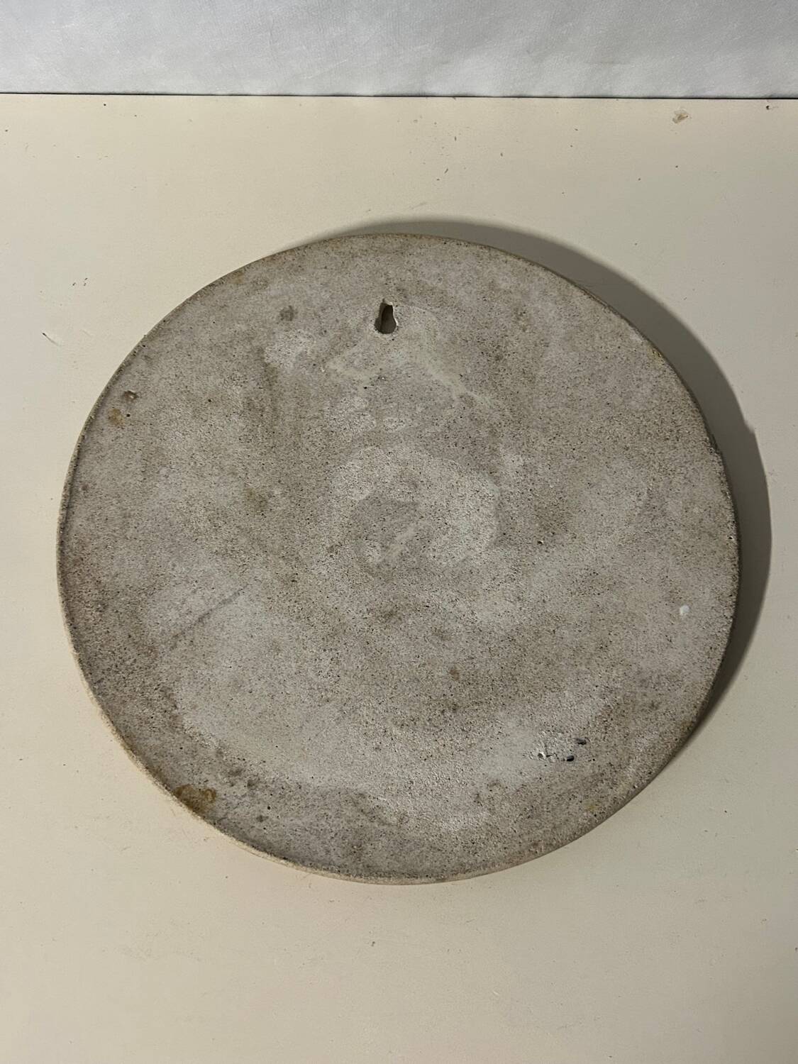 Round ceramic mirror