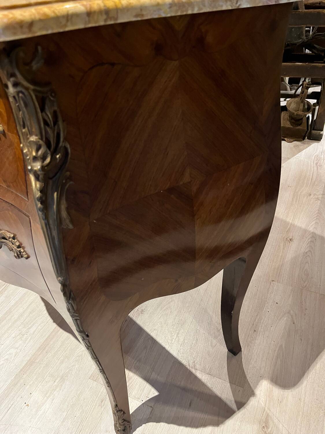 Curved chest of drawers with marquetry and marble