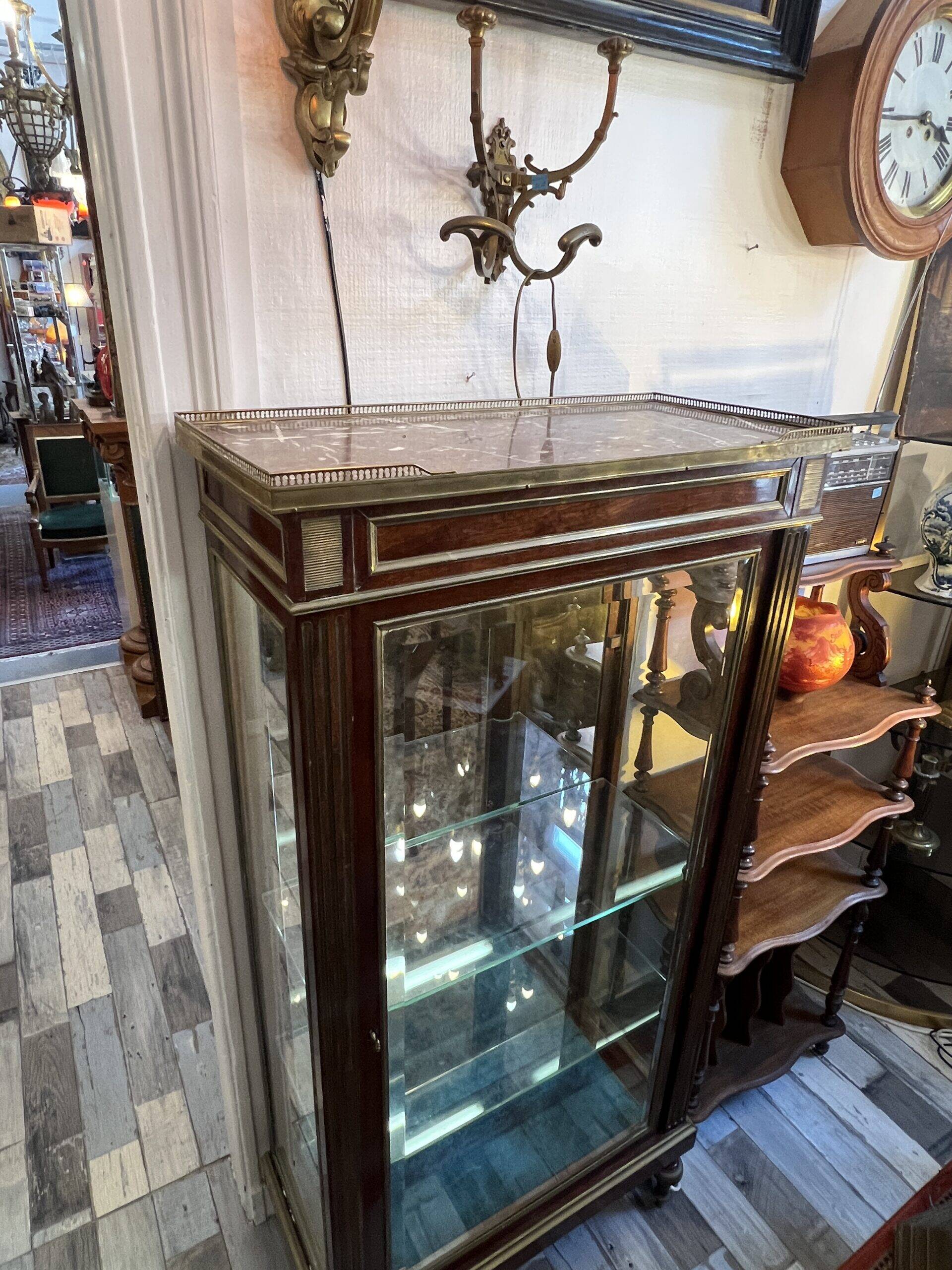 Louis XVI style display cabinet, in mahogany and mahogany veneer, with a red marble top with gallery