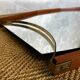 Wall mirror with brass detail and leather mounting, Vetreria Andreini, Ravenna, Italy, 1950s
