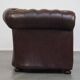 Beautiful and spacious dark brown mottled English cow leather Chesterfield armchair