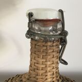 Glass bottle and wicker