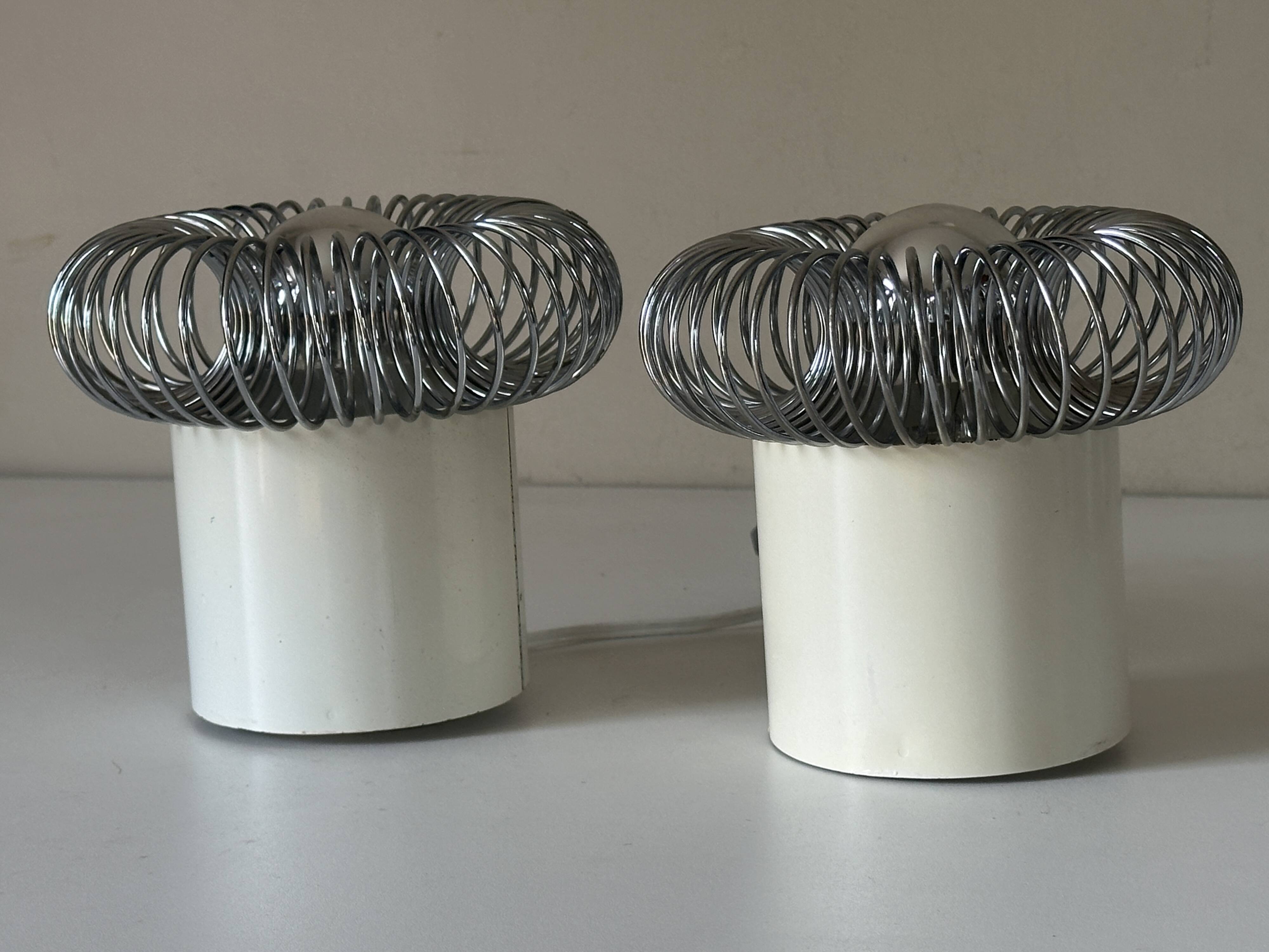 Pair of vintage design spring lamp wall lights from the 70s