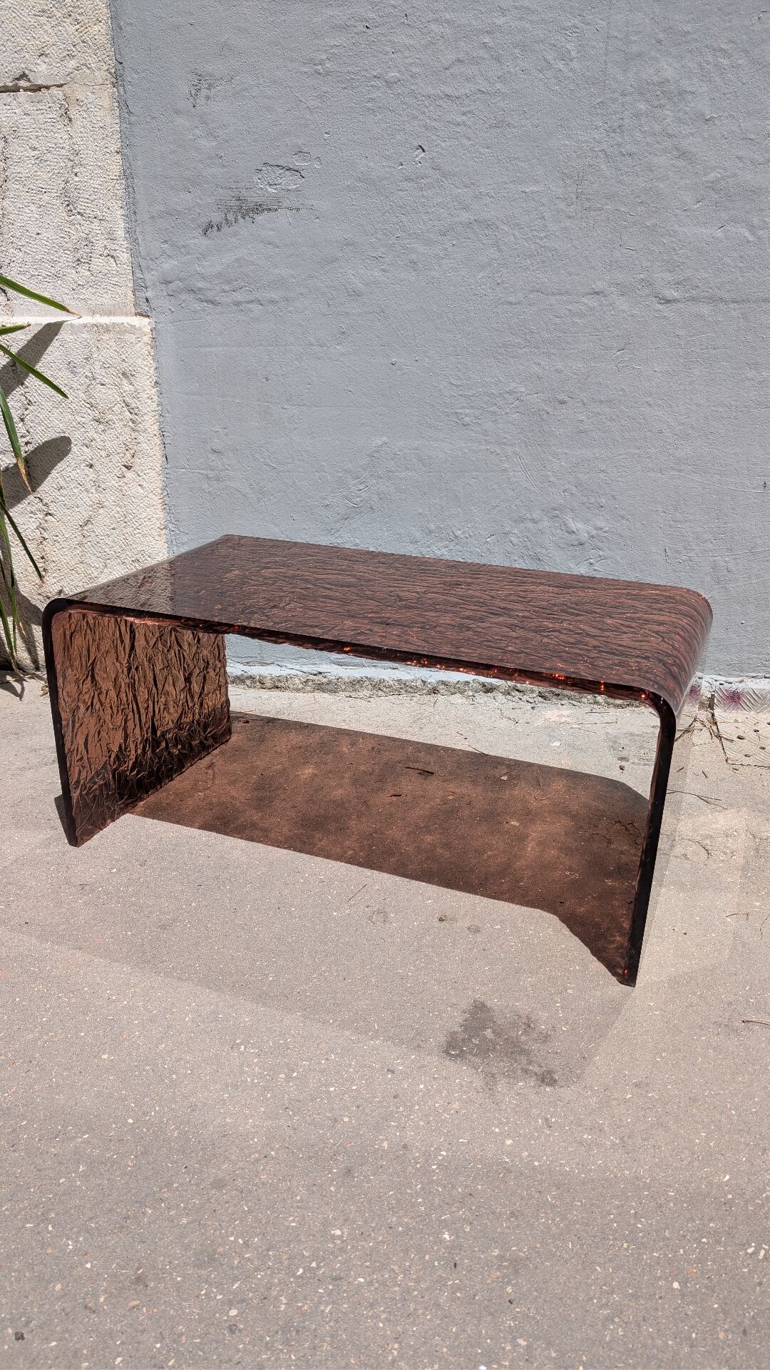 Smoked plexiglass coffee table