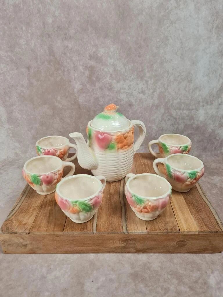 Adorable little vintage tea set in coloured earthenware.
