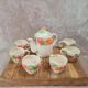 Adorable little vintage tea set in coloured earthenware.