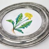 Decorative wall plate in earthenware and pewter with dandelion
