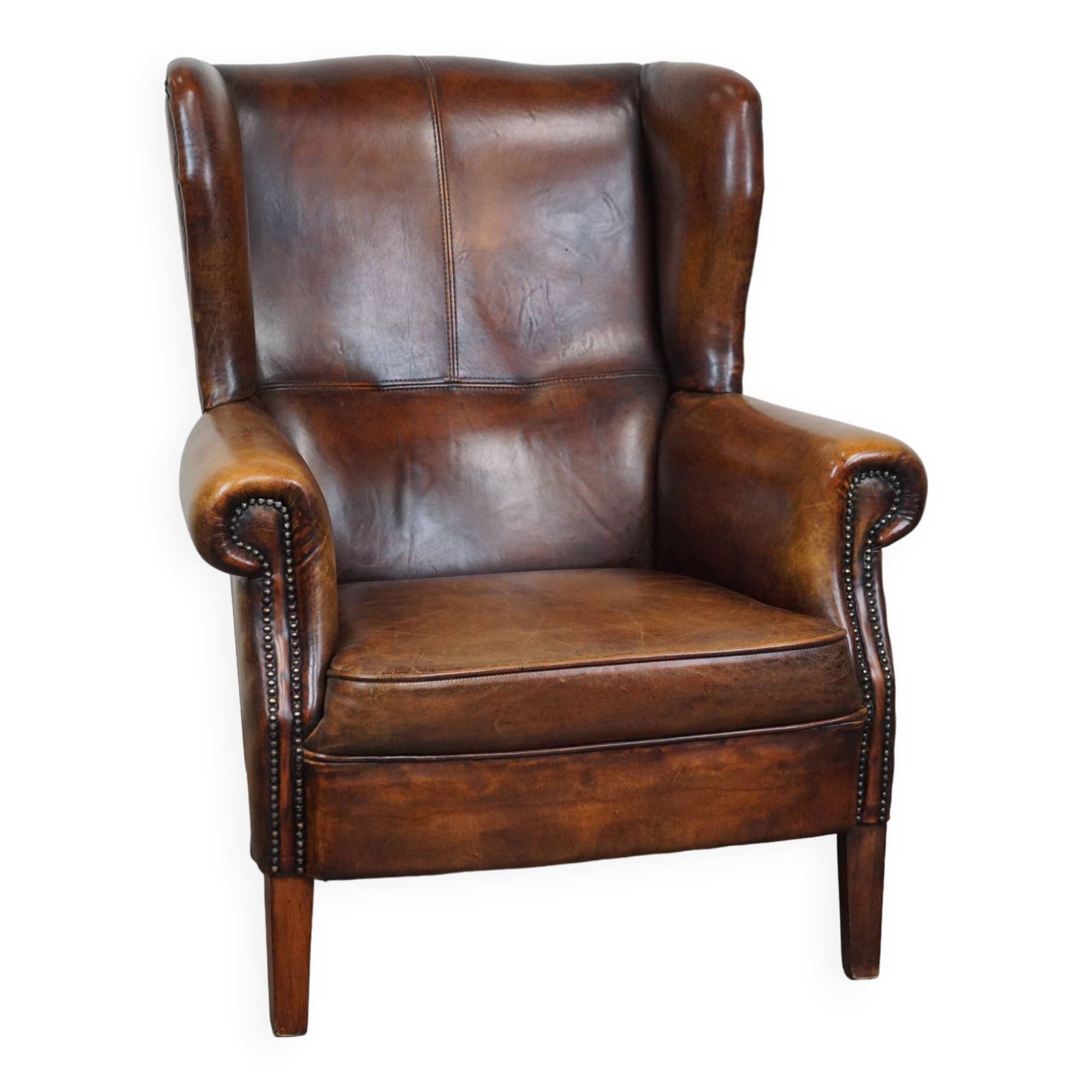 large wingback chair made of sheepskin leather with uniquely beautiful colors