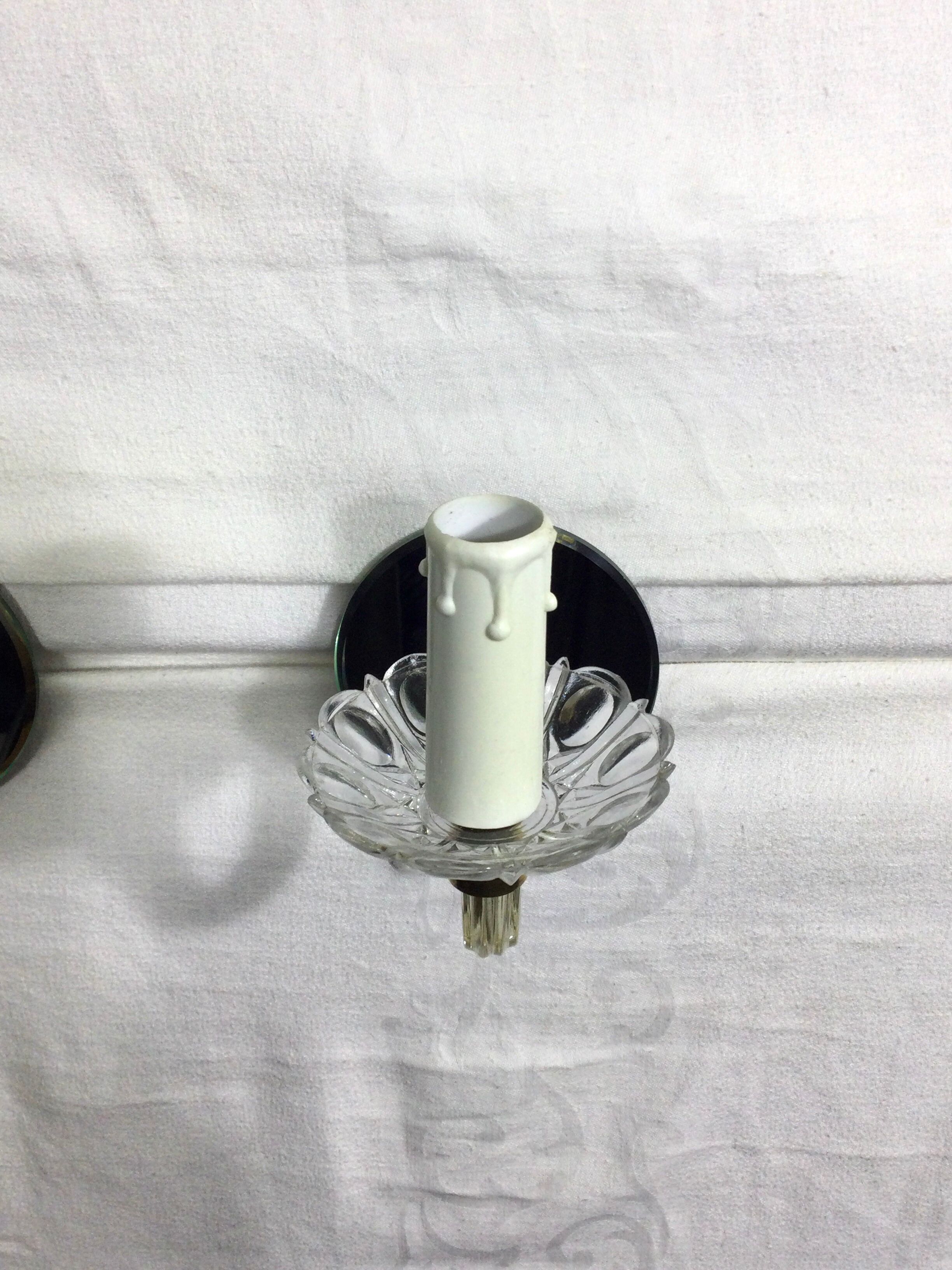 Pair of glass and mirror sconces