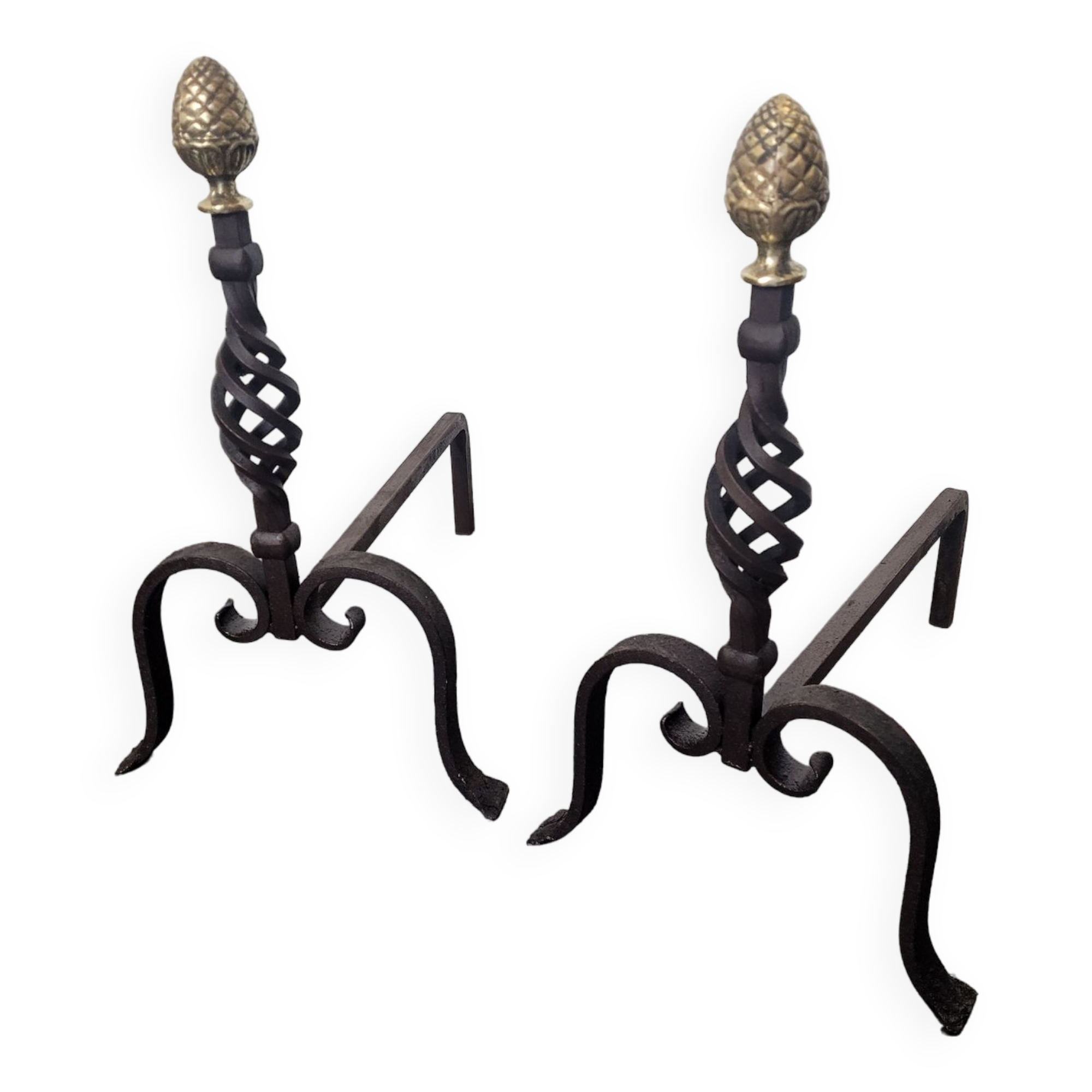 Old pair of wrought iron pegs with brass pine cone