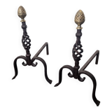 Old pair of wrought iron pegs with brass pine cone