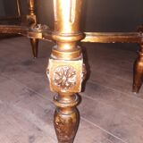 Oval coffee table in gilded wood in the Louis XVI style.