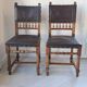 Pair of antique chairs in embossed leather, Henri II style.