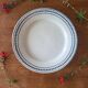 Old opaque porcelain plate gien terre de fer "laurels"