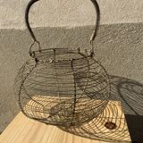 Vintage iron egg basket with hanse antique
