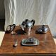 Tea set including teapot, milk jug, sugar bowl and butter dish
