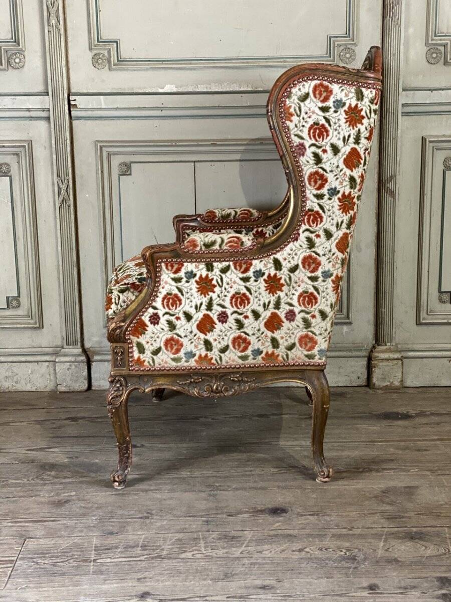 Regency style armchair in gilded wood