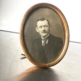 Metal gold colored oval picture frame brass