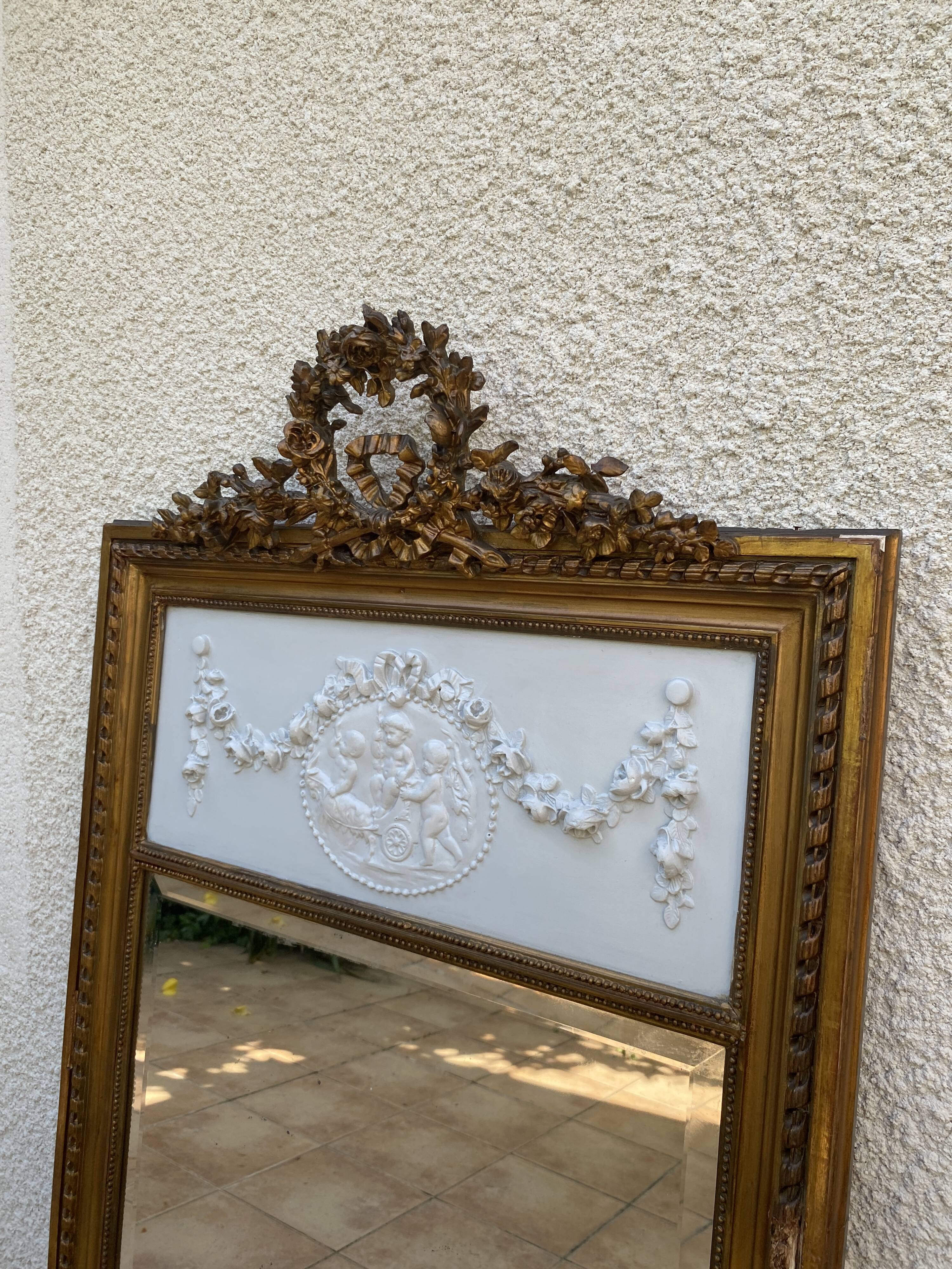 19th century Louis XVI style mirror in wood gilded with gold leaf, 74x150cm