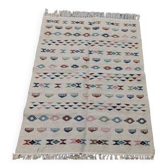 White margoum carpet with multicolored Berber patterns