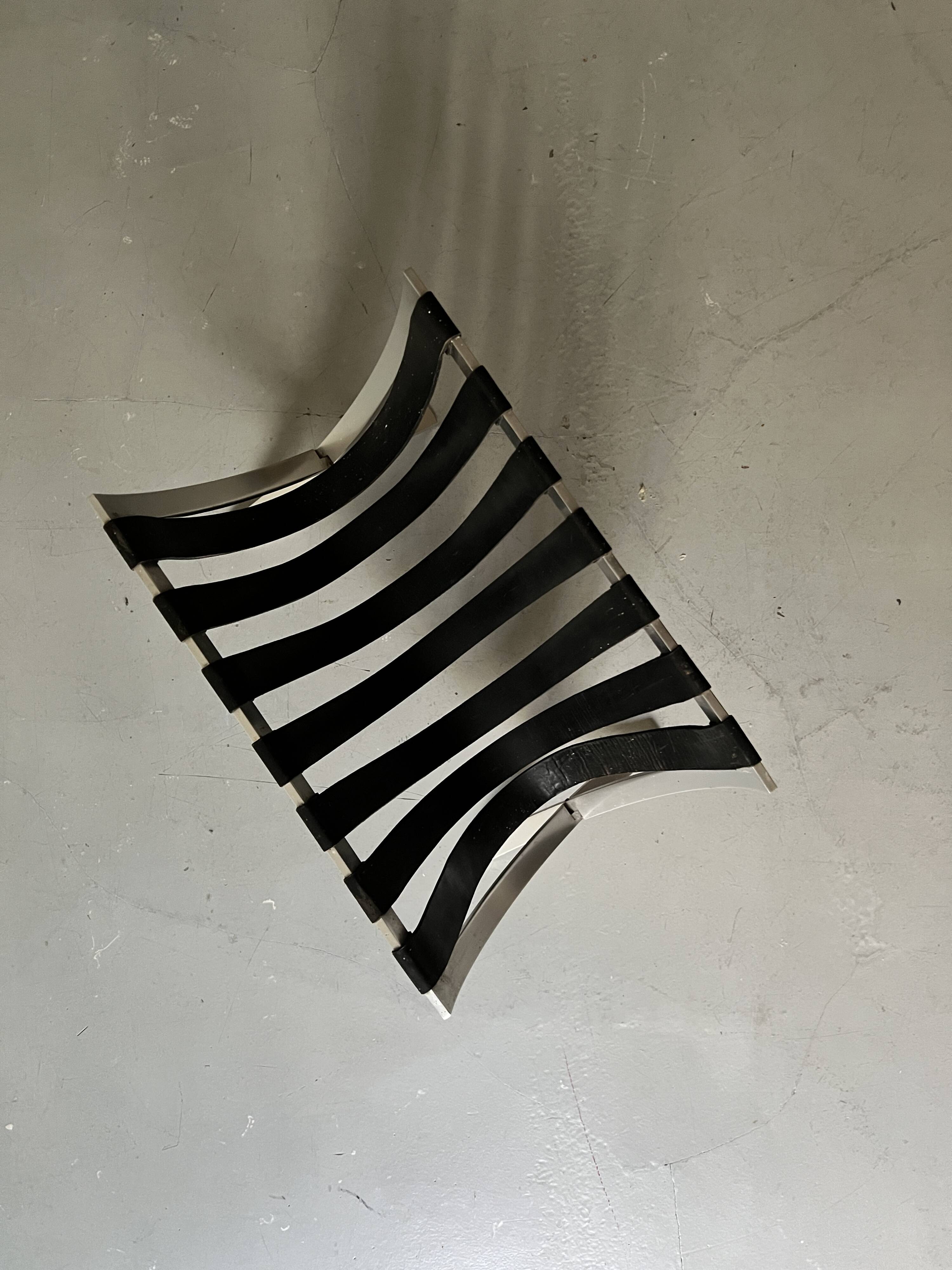 Large Barcelona magazine rack in chrome and leather straps, design circa 1970