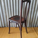 Curved wooden bistro chair