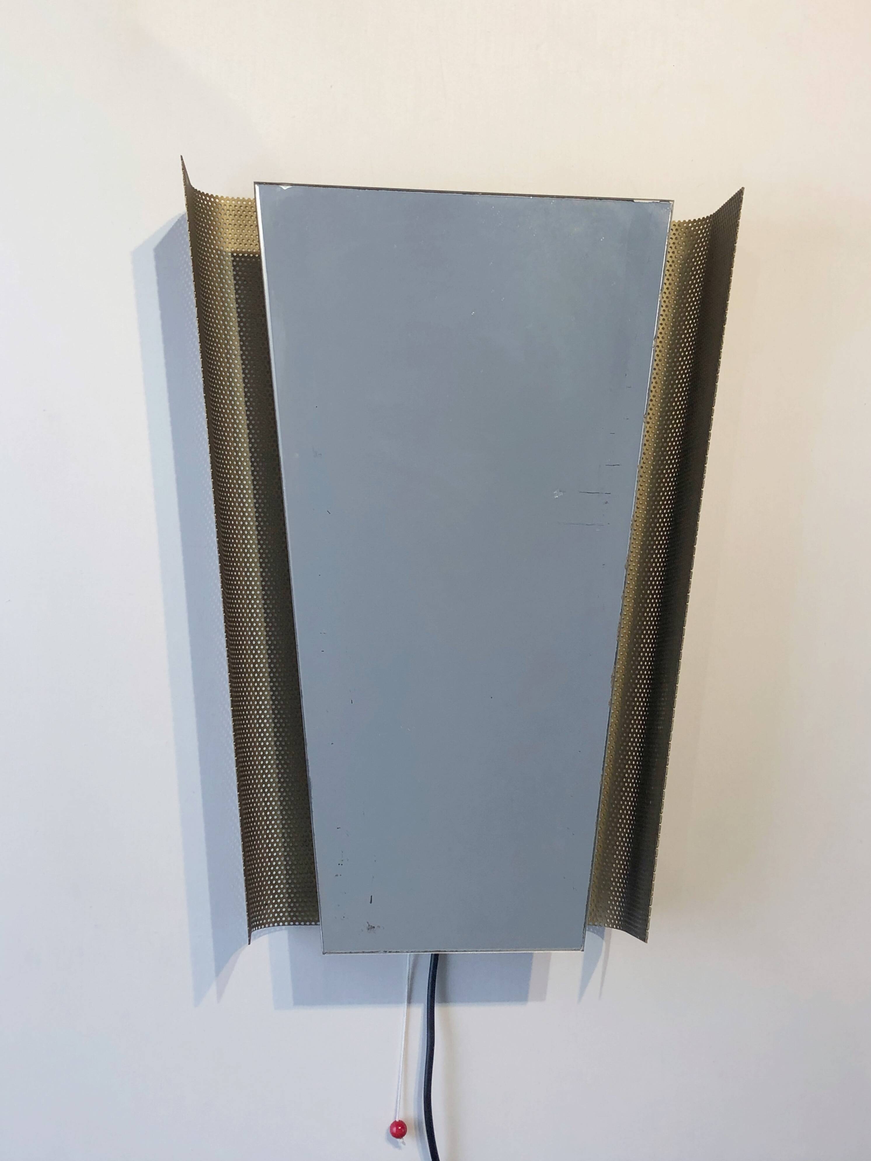 Backlit wall mirror by Floris H. Fidelij