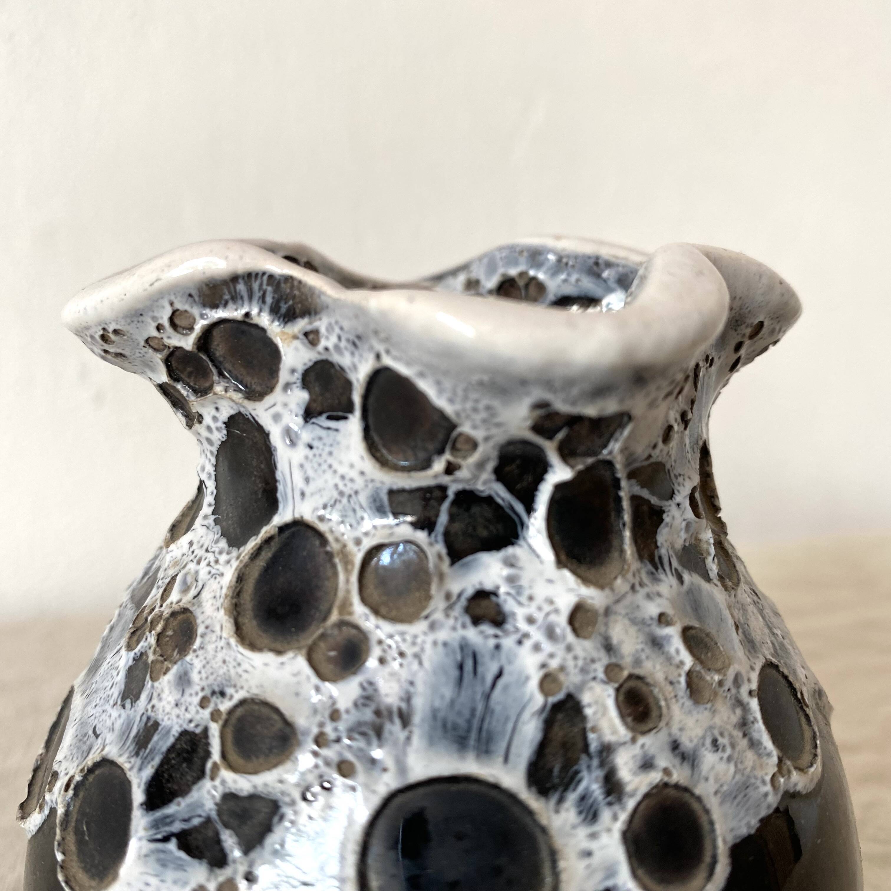 Vintage black and white Savoyard enamel vase