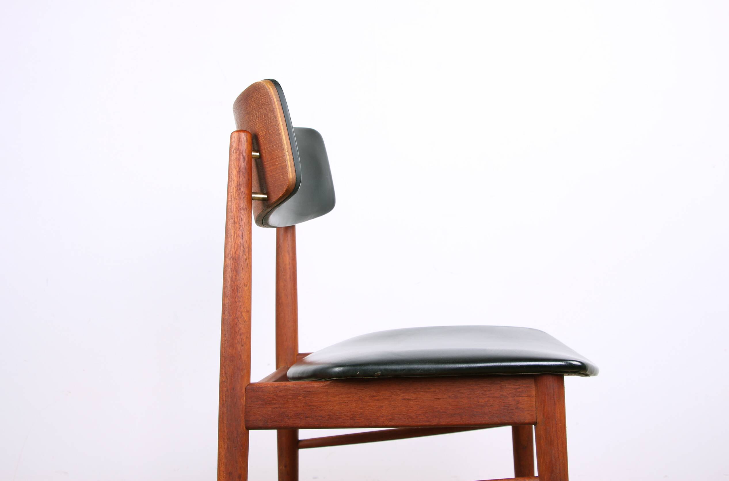Set of 4 Danish chairs in teak, black skai and brass by Sax 1960.