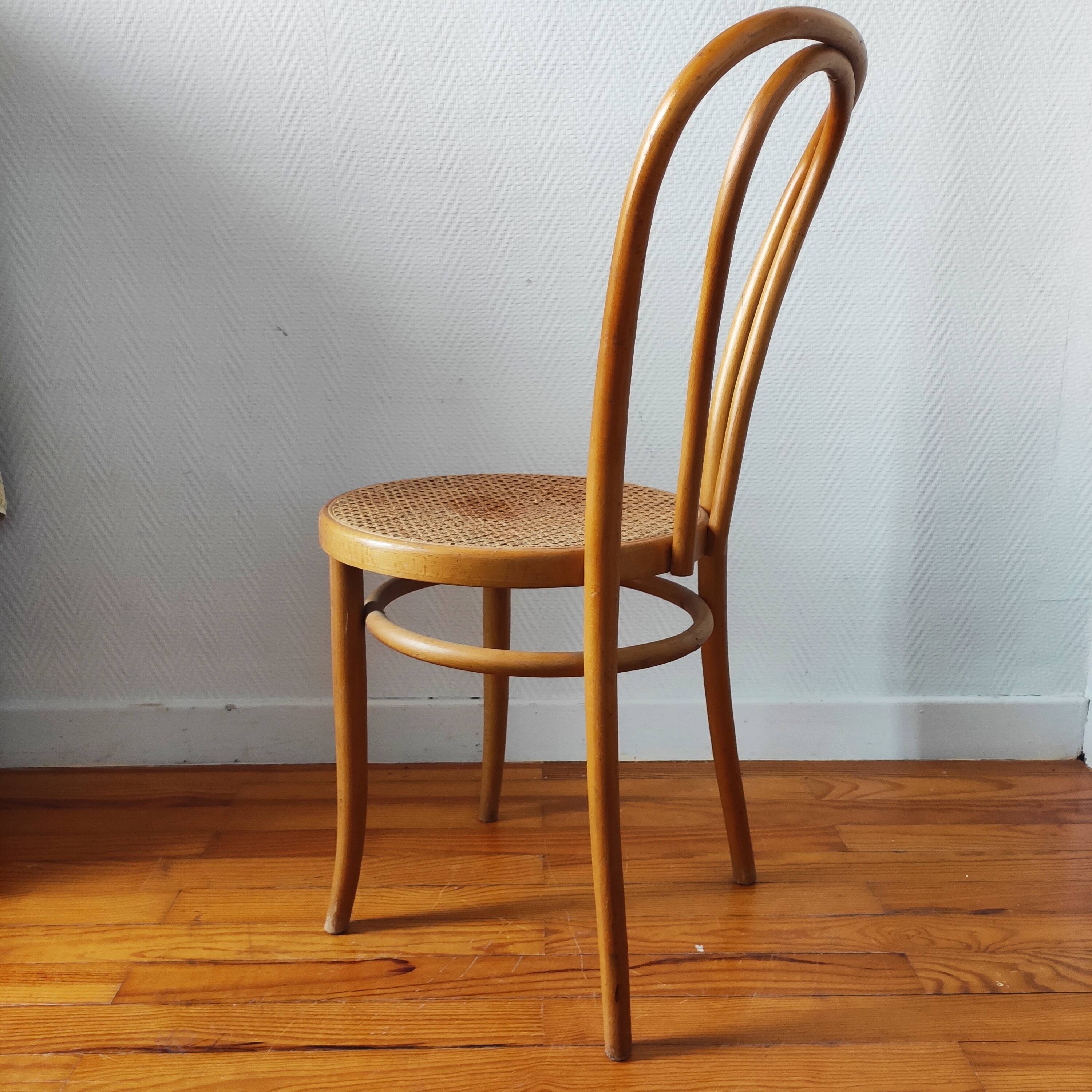 Chaise bistrot ancienne en bois blond courbé et cannage