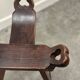 Set of 3 rustic carved oak bar stools with iron footrests, 1970s