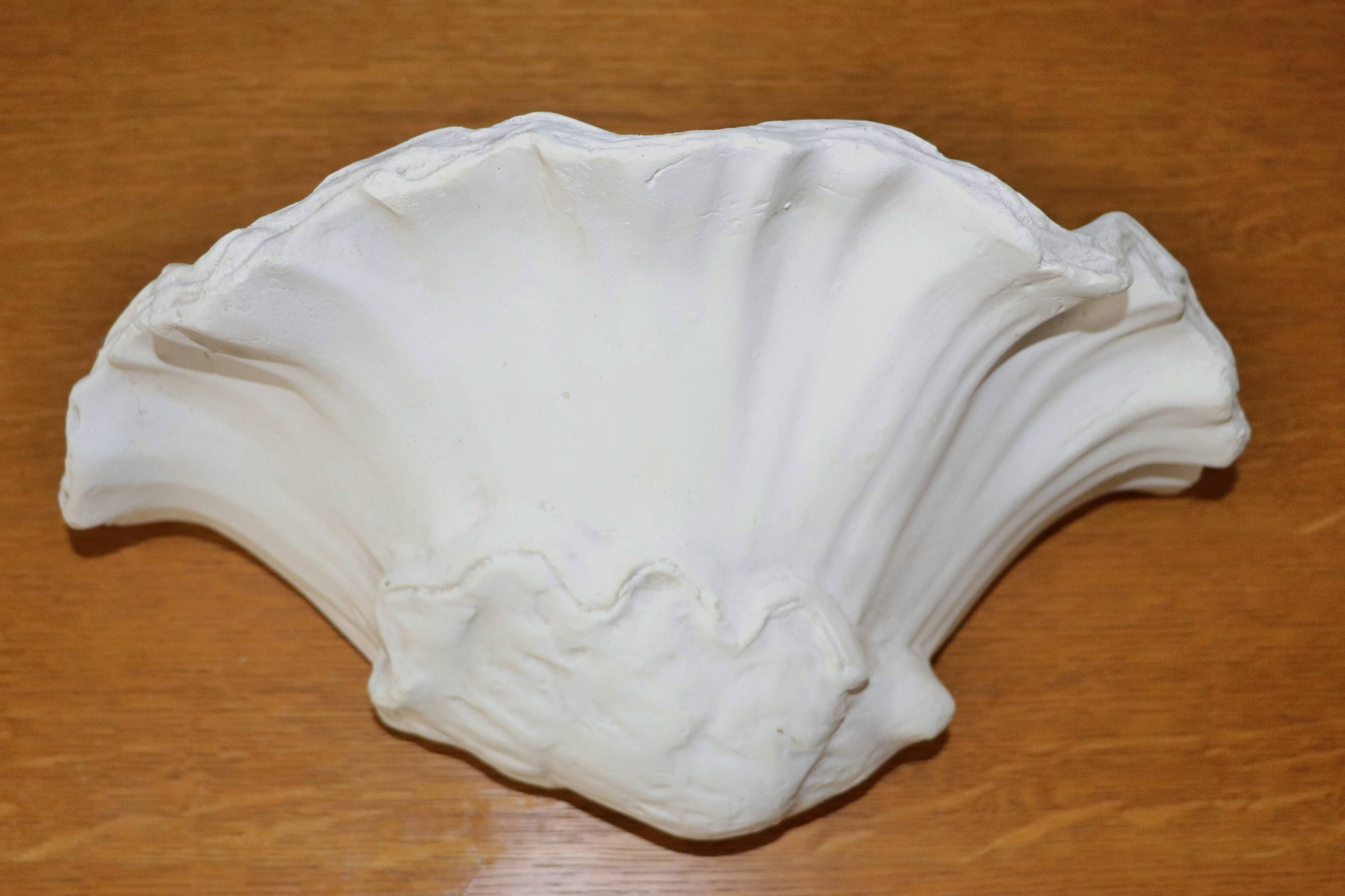 Pair of wall lamps plaster shell circa 1930