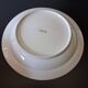 Round hollow serving plate in porcelain from Chastagner et Cie in good condition.