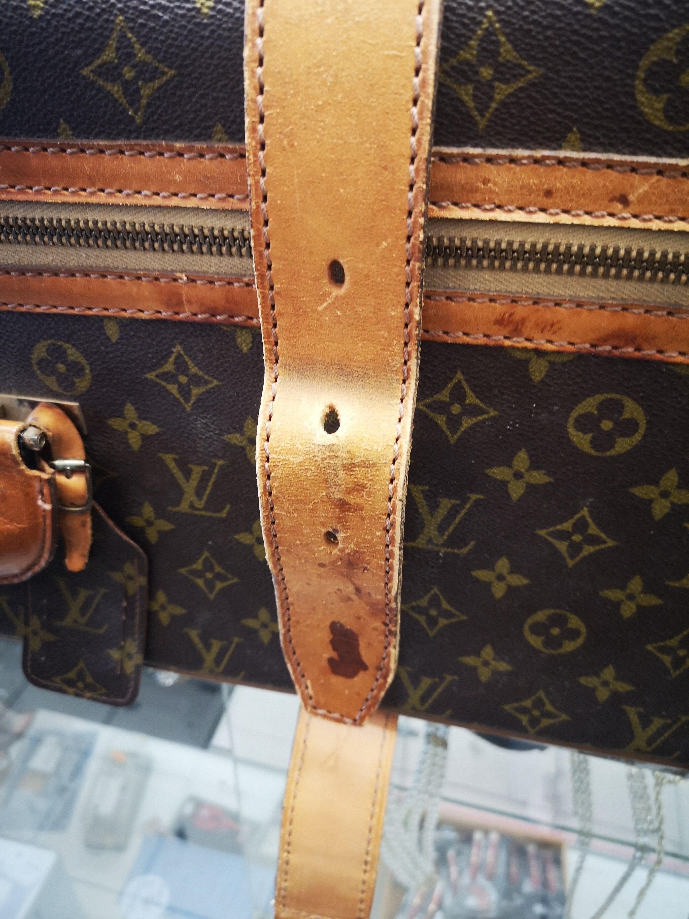 Louis Vuitton leather suitcase