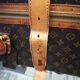 Louis Vuitton leather suitcase