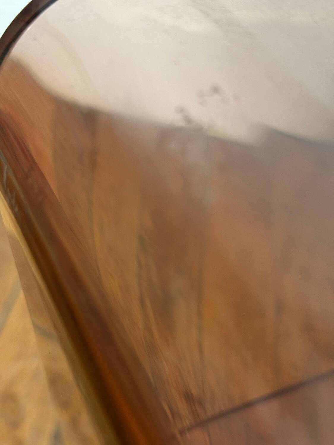 Smoked Plexiglas coffee table on wheels -