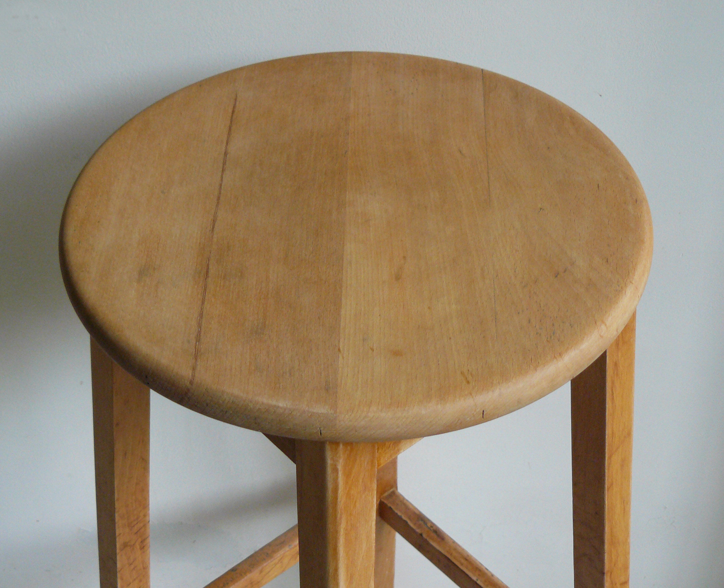 High wooden tabouret