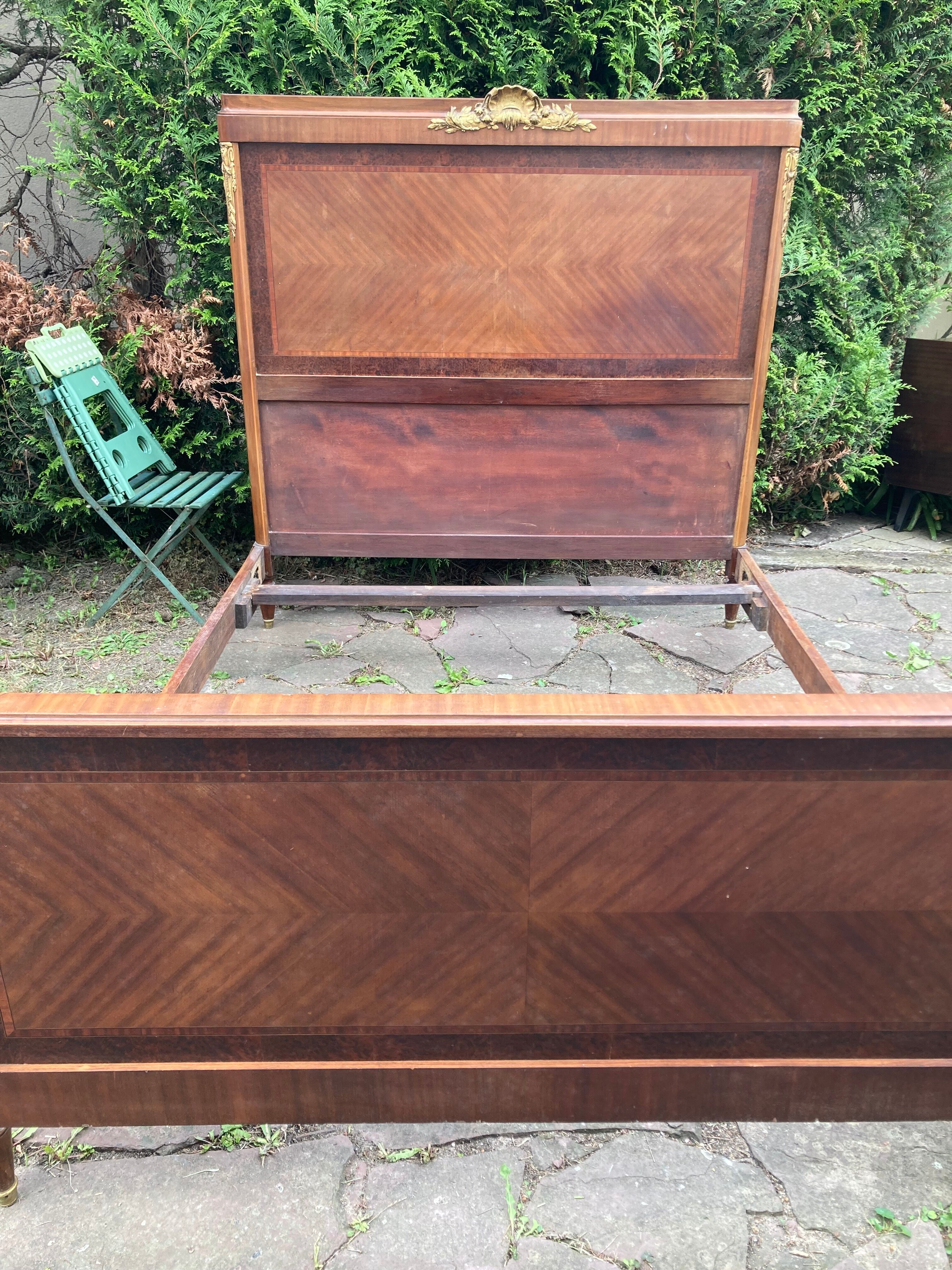 1926 tuya and mahogany bed