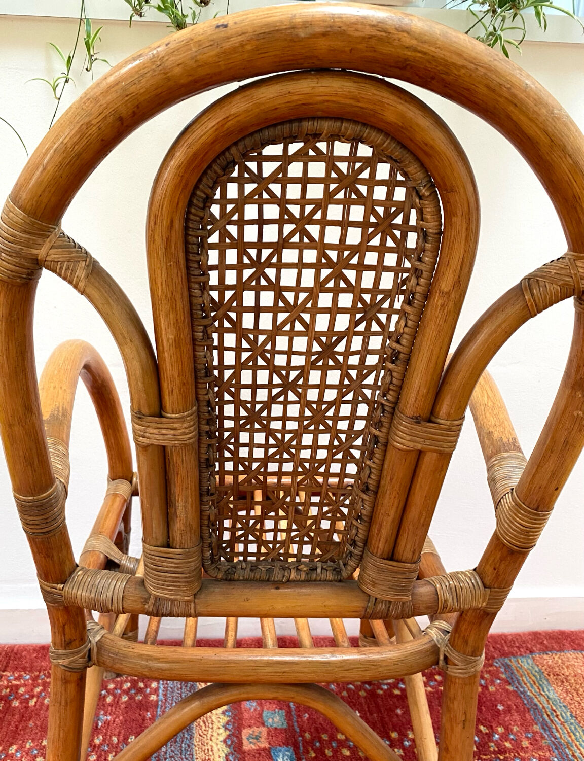 Vintage rattan and bamboo armchair from the 1970s.