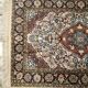 Handmade Persian wool and silk rug